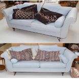 A pair of mahogany framed scroll-end sofas, upholstered in duck egg blue fabric, 244cm by 90cm by