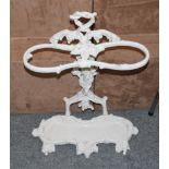 A white painted cast-iron two-division stick-stand, cast with grapes and vines, 62cm high