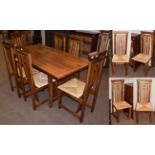 An Arts & Crafts style pine dining table, 165cm by 85cm by 78cm high; and ten matching chairs (11)