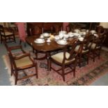 A set of eight mahogany Hepplewhite style dining chairs including two carvers