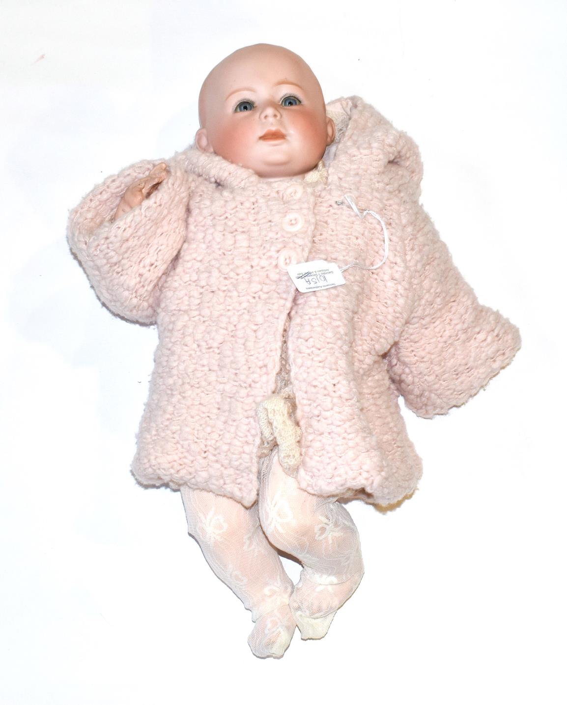 German Swaine & Co Lori bisque socket head doll, with impressed and printed mark to the back of