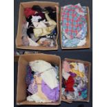 Four boxes including children's bedding, handkerchiefs, shawls, crewel work and printed panels etc
