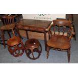 A 19th century mahogany fold over tea table together with an elm smokers chair of similar date, a