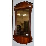 A George III mahogany Irish mirror, bearing label of Robert Strahan & Co Dublin, the tarnished