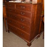 A George III Provincial oak chest of drawers, two short over four long graduated drawers, on bracket