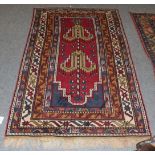 A Anatolian Prayer rug, The stepped crimson field beneath the Mihrab enclosed by multiple narrow