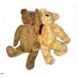 Circa 1930s yellow plush jointed teddy bear with boot button eyes, felt pads and a growler and