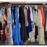 Quantity of assorted mainly 1950s and later ladies evening wear and separates etc (one rail)