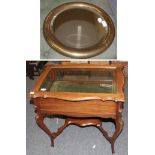 A mahogany bijouterie table with shelf stretcher and a brass mirror, 68cm by 44cm by 72cm, mirror