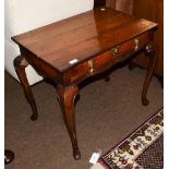 An 18th century side table, rectangular top above single drawer, brass drop handles, cabriole