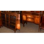 A late 19th/early 20th century mahogany and glazed bookcase, in the Chippendale style, moulded top