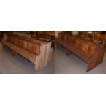 A pair of 8.5' oak church pews, 260cm wide