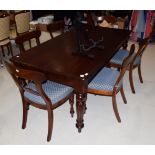 A reproduction mahogany dining table, 180cm by 93cm by 75cm high; together with a set of six similar