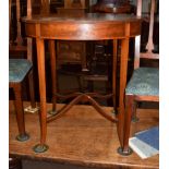 An Edwardian mahogany and inlaid oval centre table, square tapered legs, shaped X-stretcher,