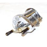 A Hardy Elarex Multiplier Reel along with a Hardy "Wanless" 2 section cane spinning rod,7' and an