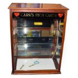 Carr's Rich Cakes Display Cabinet with gold lettering on black ground banner to top, two shelves,