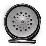 A Hardy Prefect 3 1/8'' RHW Trout Fly Reel with agate line guard.