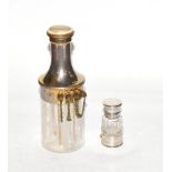 A silvered metal mounted glass four section scent bottle, tapering, the glass body engraved with