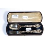 A silver spoon and fork set, by George Adams, London, cased