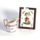 A 19th century pearl ware plaque decorated in relief with a dancer and an English porcelain jug