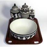 Four pieces of Wedgwood black and striped Jasper ware comprising; a bowl (26cm diameter), a twin