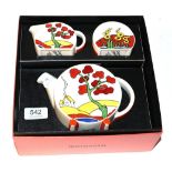 A boxed Wedgwood 'Bizarre by Clarice Cliff' Bonjour teaset