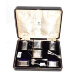 A George V silver condiment set, by R. and W. Sorley, Chester, 1928, each piece oblong and with