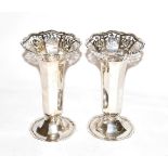 A pair of George V silver vases, by the Goldsmiths and Silversmiths Co. Ltd., London, one 1910 and