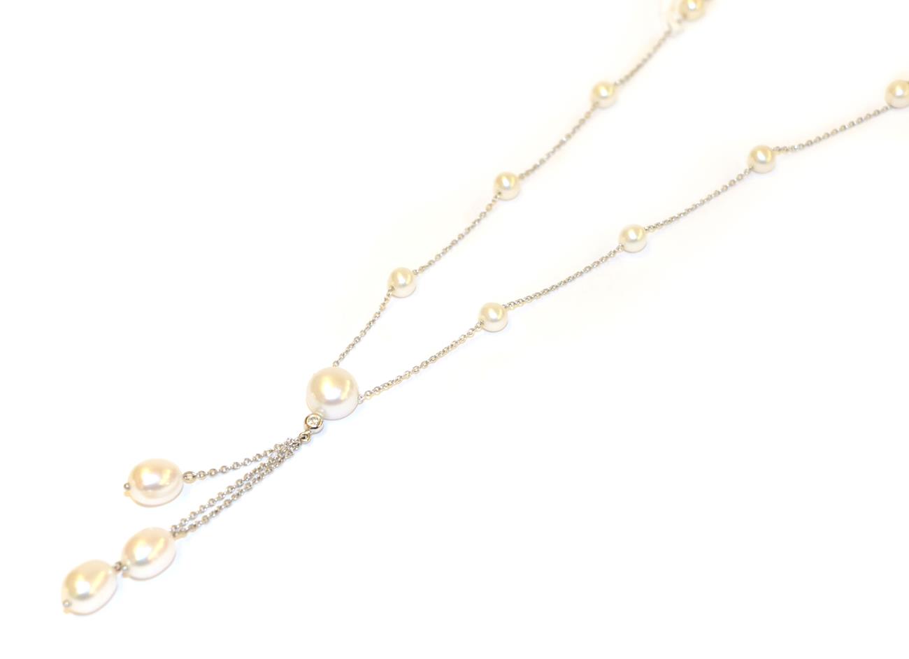 An 18 carat white gold cultured pearl and diamond necklace, the trace link chain interspaced with - Image 2 of 2