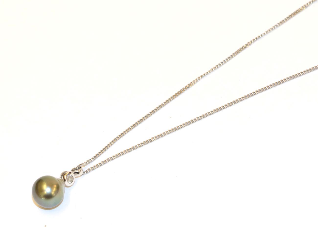 A grey cultured pearl and diamond pendant on a 9 carat white gold chain, the grey cultured pearl