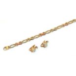 A 9 carat tri-colour gold fancy link bracelet, plain polished oval links alternate with plain