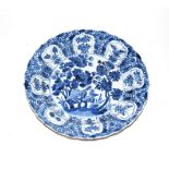 A Chinese Kangxi blue and white dish, 21cm diameter