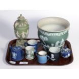 A group of Wedgwood Jasper ware including a vase, urn and cover, twin handled cups etc. miniature