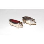 Two Edward VII silver pin-cushions, One by Levi and Salaman, Birmingham, 1902, the other by Adie and