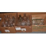 Three boxes of glass, including decanters, jugs, etc