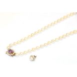A 9 carat gold cultured pearl necklace, the fifty-nine uniform cultured pearls knotted to an