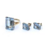 A blue synthetic spinel ring and matching earrings, the emerald-cut blue synthetic spinels in