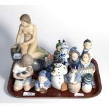 A group of Royal Copenhagen figures comprising model numbers; 4431, 1938, 3647, 3677, 5658, 4794,