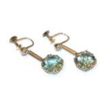 This Lot Is Being Sold On Behalf Of A Charity: A pair of blue zircon and diamond drop earrings,
