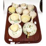 Tray of assorted Belleek tea china, including cream, sugar and a mug