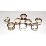 Eight various silver napkin-rings, variously decorated, 4oz 2dwt (8)