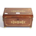 A Regency rosewood and brass inlaid tea caddy with quilt metal mounted lion mask ring handles