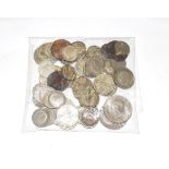 A miscellany of 62 Pre-1947 British Silver Coins comprised of: 2 x halfcrowns, 15 x florins, 40 x