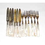 A set of six Edward VII silver and mother-of-pearl fish-knives and a set of six silver plate mounted