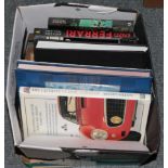 A box of car related books