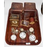 A group of watches and clocks including two Goliath pocket watches, two further pocket watches, a