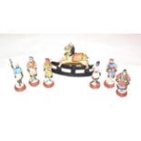 A small group of mid-19th century painted plaster Indian figures