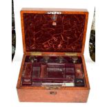 A burr walnut metal mounted travelling vanity case by Coombs & co