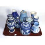 A group of Wedgwood, Adams and other blue Jasper ware including teapots, jugs, urns etc. candle