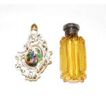 An amber coloured glass scent-bottle with silvered mount, tapering, the cut-glass body with